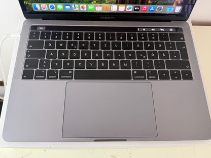 MacBook Pro (2018) [13,3", Touch Bar, Intel Core i7 2,7GHz, 16GB RAM, 256GB SSD, Intel Iris Graphics 655, macOS] Grigio